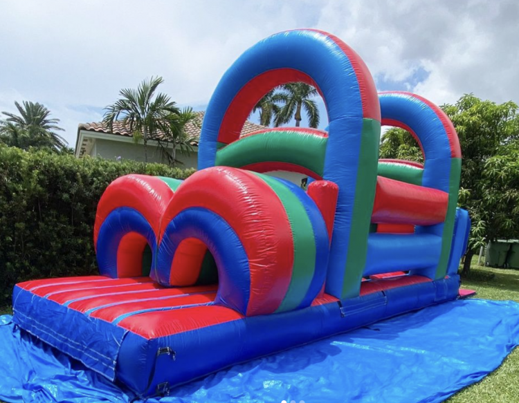 Bounce House Rentals in Dania Beach, FL: A colorful inflatable bounce house ready for a birthday party.